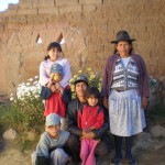 Dario Ramos with his wife, Christina, and 4 of their youngest children, Zenaida (14), Alex (8), Richard (9), and Nayeli (5), at their home in Morado K’asa.